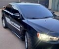 Чорний Міцубісі Lancer, об'ємом двигуна 2 л та пробігом 170 тис. км за 6800 $, фото 2 на Automoto.ua