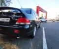 Чорний Міцубісі Lancer, об'ємом двигуна 1.6 л та пробігом 221 тис. км за 4600 $, фото 4 на Automoto.ua