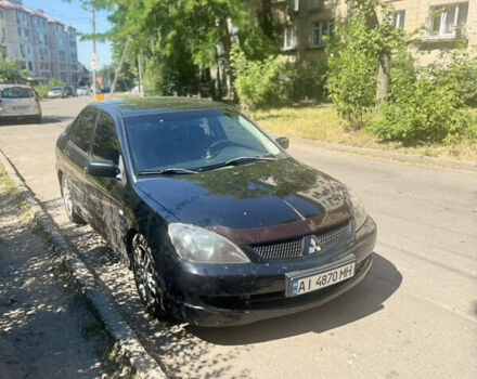 Чорний Міцубісі Lancer, об'ємом двигуна 2 л та пробігом 210 тис. км за 5500 $, фото 45 на Automoto.ua