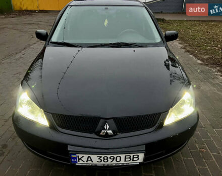 Чорний Міцубісі Lancer, об'ємом двигуна 1.6 л та пробігом 303 тис. км за 4350 $, фото 30 на Automoto.ua