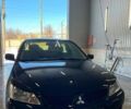 Черный Мицубиси Лансер, объемом двигателя 1.6 л и пробегом 307 тыс. км за 4000 $, фото 1 на Automoto.ua