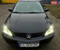 Чорний Міцубісі Lancer, об'ємом двигуна 1.6 л та пробігом 303 тис. км за 4350 $, фото 30 на Automoto.ua