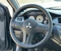 Чорний Міцубісі Lancer, об'ємом двигуна 1.6 л та пробігом 191 тис. км за 4899 $, фото 13 на Automoto.ua