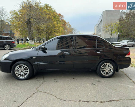 Чорний Міцубісі Lancer, об'ємом двигуна 1.58 л та пробігом 173 тис. км за 4700 $, фото 1 на Automoto.ua