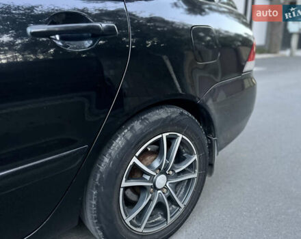 Черный Мицубиси Лансер, объемом двигателя 1.58 л и пробегом 278 тыс. км за 4800 $, фото 16 на Automoto.ua