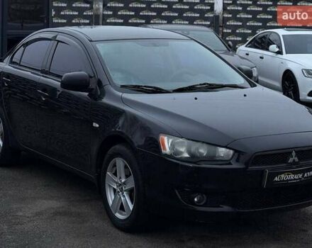 Черный Мицубиси Лансер, объемом двигателя 1.5 л и пробегом 245 тыс. км за 4499 $, фото 1 на Automoto.ua
