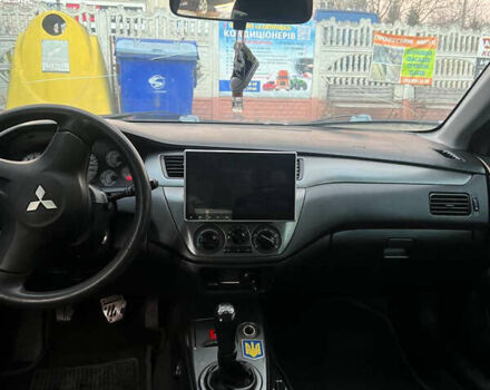 Черный Мицубиси Лансер, объемом двигателя 1.6 л и пробегом 180 тыс. км за 3499 $, фото 15 на Automoto.ua