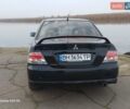 Черный Мицубиси Лансер, объемом двигателя 2 л и пробегом 286 тыс. км за 4000 $, фото 8 на Automoto.ua