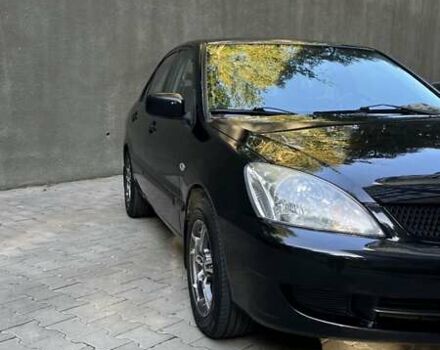 Чорний Міцубісі Lancer, об'ємом двигуна 1.58 л та пробігом 135 тис. км за 4100 $, фото 6 на Automoto.ua