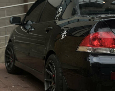 Черный Мицубиси Лансер, объемом двигателя 1.6 л и пробегом 211 тыс. км за 5700 $, фото 43 на Automoto.ua