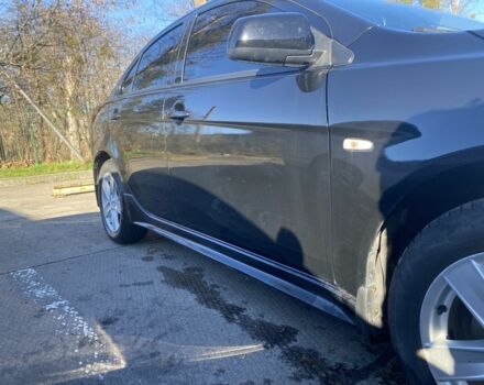 Черный Мицубиси Лансер, объемом двигателя 2 л и пробегом 372 тыс. км за 6200 $, фото 8 на Automoto.ua