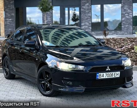 Чорний Міцубісі Lancer, об'ємом двигуна 2 л та пробігом 205 тис. км за 6500 $, фото 5 на Automoto.ua