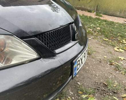 Черный Мицубиси Лансер, объемом двигателя 1.6 л и пробегом 258 тыс. км за 2999 $, фото 7 на Automoto.ua