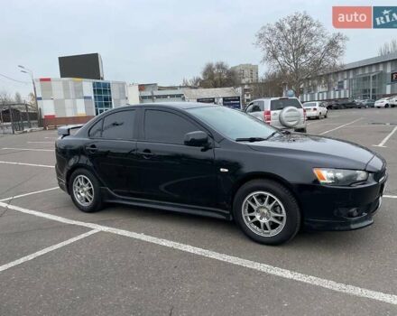 Черный Мицубиси Лансер, объемом двигателя 2 л и пробегом 246 тыс. км за 7500 $, фото 7 на Automoto.ua