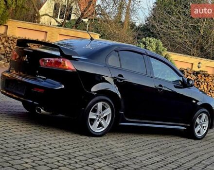 Чорний Міцубісі Lancer, об'ємом двигуна 2 л та пробігом 260 тис. км за 6555 $, фото 10 на Automoto.ua