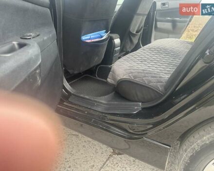 Чорний Міцубісі Lancer, об'ємом двигуна 1.6 л та пробігом 310 тис. км за 5100 $, фото 6 на Automoto.ua