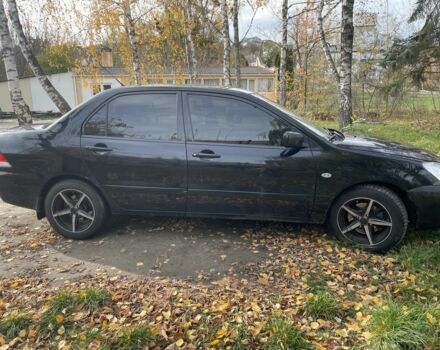 Міцубісі Lancer 2007 у Каневе на Automoto.ua Чорний Міцубісі Lancer, об'ємом двигуна 1.6 л та пробігом 310 тис. км за 4100 $, фото 6 на Automoto.ua