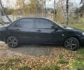 Міцубісі Lancer 2007 у Каневе на Automoto.ua Чорний Міцубісі Lancer, об'ємом двигуна 1.6 л та пробігом 310 тис. км за 4100 $, фото 6 на Automoto.ua