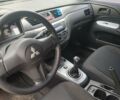 Чорний Міцубісі Lancer, об'ємом двигуна 1.58 л та пробігом 190 тис. км за 3750 $, фото 13 на Automoto.ua