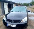 Чорний Міцубісі Lancer, об'ємом двигуна 1.6 л та пробігом 250 тис. км за 4400 $, фото 1 на Automoto.ua