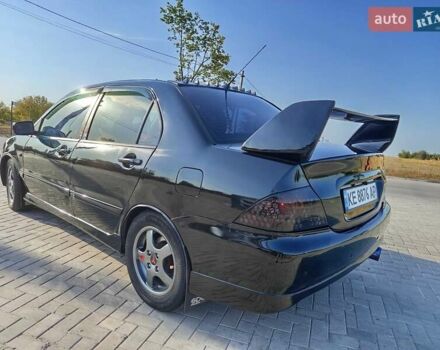 Черный Мицубиси Лансер, объемом двигателя 1.6 л и пробегом 320 тыс. км за 4500 $, фото 3 на Automoto.ua