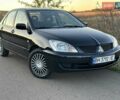 Черный Мицубиси Лансер, объемом двигателя 1.58 л и пробегом 139 тыс. км за 5200 $, фото 9 на Automoto.ua