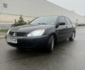 Чорний Міцубісі Lancer, об'ємом двигуна 1.58 л та пробігом 256 тис. км за 3700 $, фото 1 на Automoto.ua