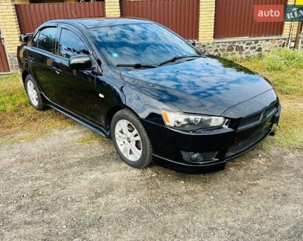Чорний Міцубісі Lancer, об'ємом двигуна 2 л та пробігом 284 тис. км за 6200 $, фото 4 на Automoto.ua