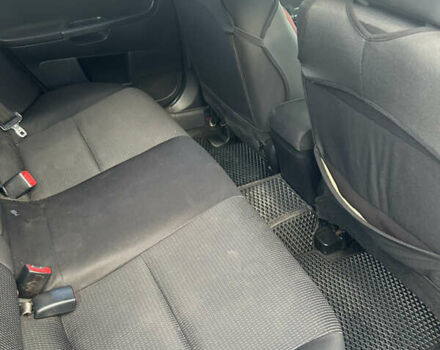 Черный Мицубиси Лансер, объемом двигателя 2 л и пробегом 208 тыс. км за 6500 $, фото 11 на Automoto.ua