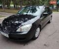 Чорний Міцубісі Lancer, об'ємом двигуна 1.58 л та пробігом 137 тис. км за 4699 $, фото 1 на Automoto.ua