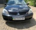 Чорний Міцубісі Lancer, об'ємом двигуна 1.6 л та пробігом 250 тис. км за 4200 $, фото 1 на Automoto.ua
