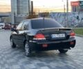 Чорний Міцубісі Lancer, об'ємом двигуна 1.58 л та пробігом 237 тис. км за 4300 $, фото 2 на Automoto.ua