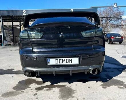 Чорний Міцубісі Lancer, об'ємом двигуна 2 л та пробігом 226 тис. км за 7200 $, фото 3 на Automoto.ua