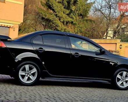Чорний Міцубісі Lancer, об'ємом двигуна 2 л та пробігом 260 тис. км за 6555 $, фото 17 на Automoto.ua