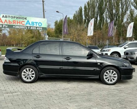 Мицубиси Лансер 2007 в Кривом Роге на Automoto.ua Черный Мицубиси Лансер, объемом двигателя 2 л и пробегом 143 тыс. км за 5400 $, фото 6 на Automoto.ua