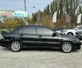 Мицубиси Лансер 2007 в Кривом Роге на Automoto.ua Черный Мицубиси Лансер, объемом двигателя 2 л и пробегом 143 тыс. км за 5400 $, фото 6 на Automoto.ua
