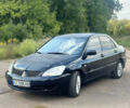 Мицубиси Лансер 2007 в Харькове на Automoto.ua Черный Мицубиси Лансер, объемом двигателя 1.58 л и пробегом 278 тыс. км за 3500 $, фото 1 на Automoto.ua