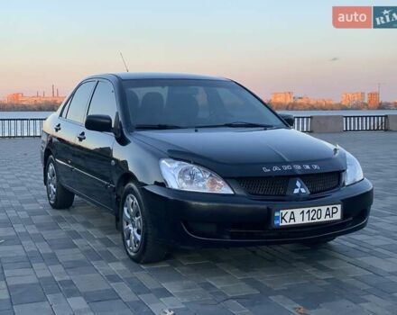 Чорний Міцубісі Lancer, об'ємом двигуна 1.58 л та пробігом 237 тис. км за 4300 $, фото 6 на Automoto.ua