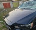 Черный Мицубиси Лансер, объемом двигателя 2 л и пробегом 239 тыс. км за 3000 $, фото 2 на Automoto.ua