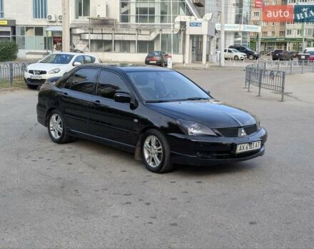 Чорний Міцубісі Lancer, об'ємом двигуна 2 л та пробігом 152 тис. км за 5500 $, фото 8 на Automoto.ua