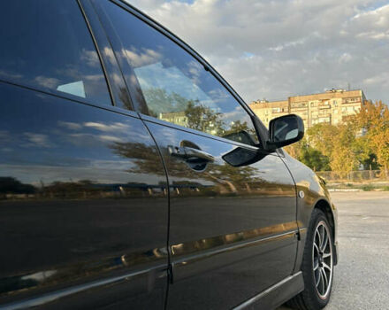 Чорний Міцубісі Lancer, об'ємом двигуна 2 л та пробігом 280 тис. км за 4600 $, фото 25 на Automoto.ua