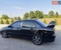 Черный Мицубиси Лансер, объемом двигателя 1.6 л и пробегом 320 тыс. км за 4500 $, фото 5 на Automoto.ua