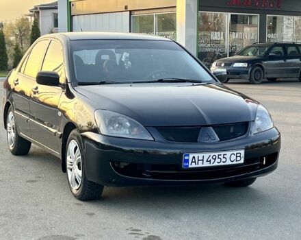 Чорний Міцубісі Lancer, об'ємом двигуна 0.16 л та пробігом 202 тис. км за 3900 $, фото 5 на Automoto.ua