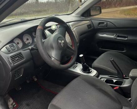 Черный Мицубиси Лансер, объемом двигателя 1.6 л и пробегом 272 тыс. км за 2800 $, фото 13 на Automoto.ua