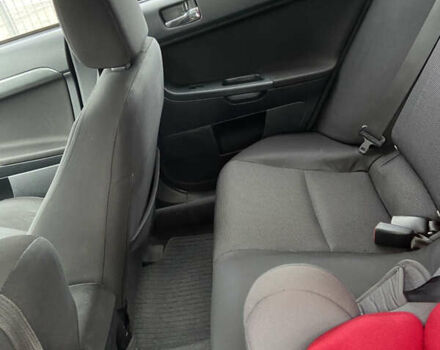 Чорний Міцубісі Lancer, об'ємом двигуна 2 л та пробігом 222 тис. км за 7500 $, фото 18 на Automoto.ua