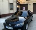 Черный Мицубиси Лансер, объемом двигателя 1.6 л и пробегом 300 тыс. км за 4500 $, фото 1 на Automoto.ua