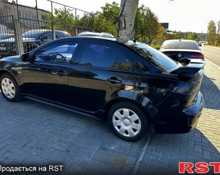 Черный Мицубиси Лансер, объемом двигателя 2 л и пробегом 250 тыс. км за 5900 $, фото 3 на Automoto.ua