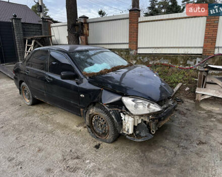 Черный Мицубиси Лансер, объемом двигателя 1.58 л и пробегом 160 тыс. км за 1299 $, фото 3 на Automoto.ua