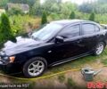 Черный Мицубиси Лансер, объемом двигателя 2 л и пробегом 230 тыс. км за 5999 $, фото 1 на Automoto.ua