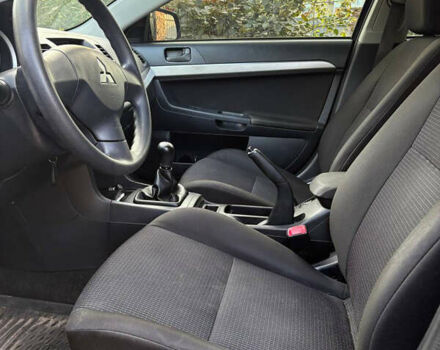 Черный Мицубиси Лансер, объемом двигателя 1.5 л и пробегом 111 тыс. км за 7500 $, фото 13 на Automoto.ua